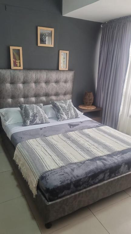 Postel nebo postele na pokoji v ubytování TORRE EJECUTIVA hotel
