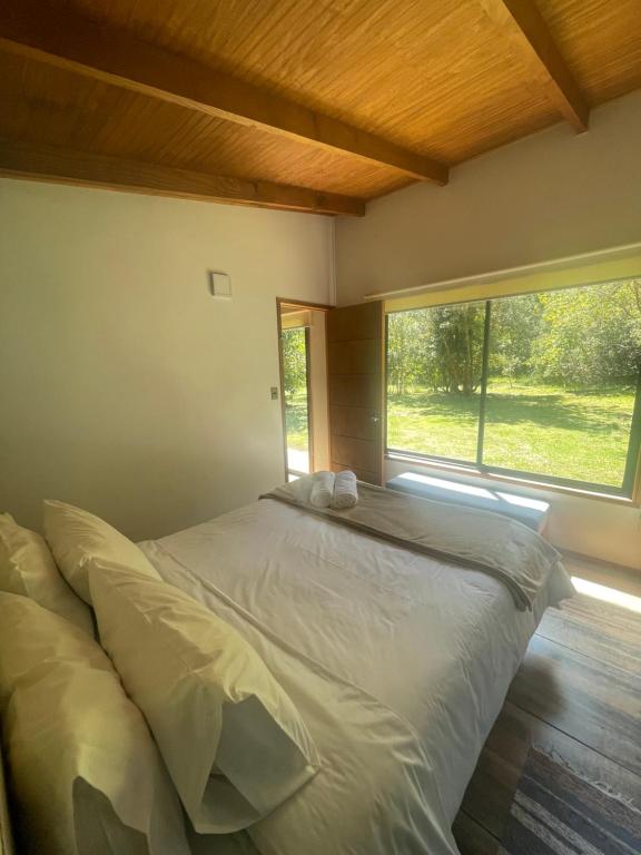 Postel nebo postele na pokoji v ubytování Pucura Eco Lodge