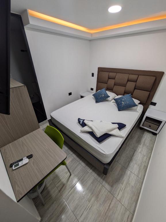 Postel nebo postele na pokoji v ubytování Hostel Boutique Nido de Loros