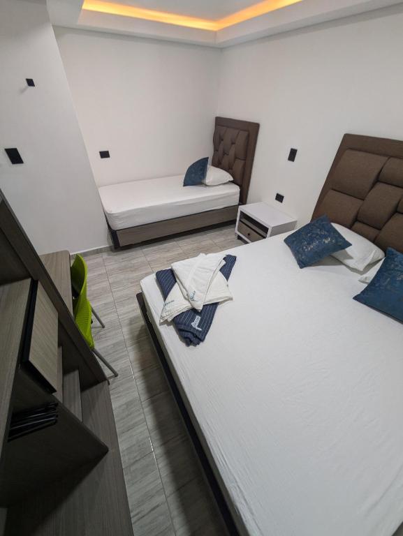 Postel nebo postele na pokoji v ubytování Hostel Boutique Nido de Loros