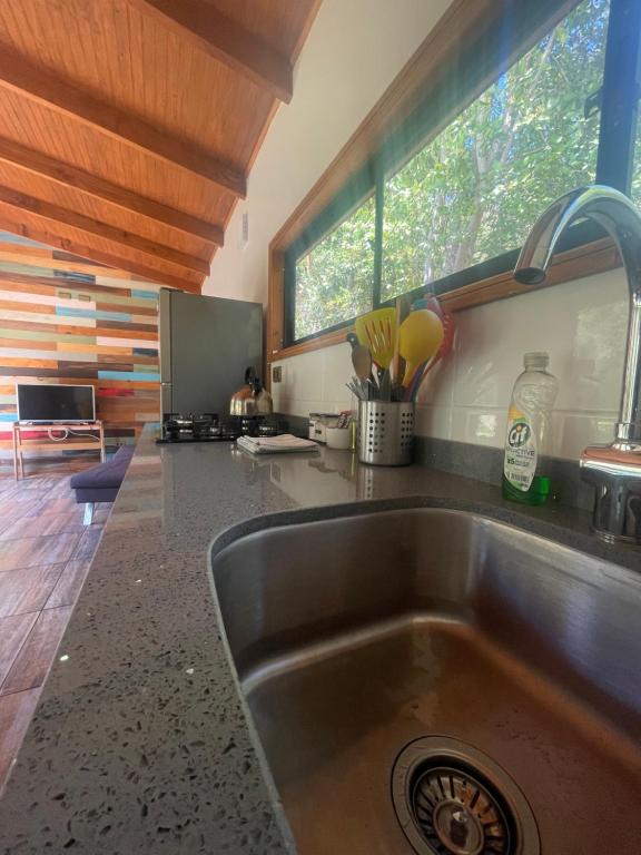 Kuchyň nebo kuchyňský kout v ubytování Pucura Eco Lodge