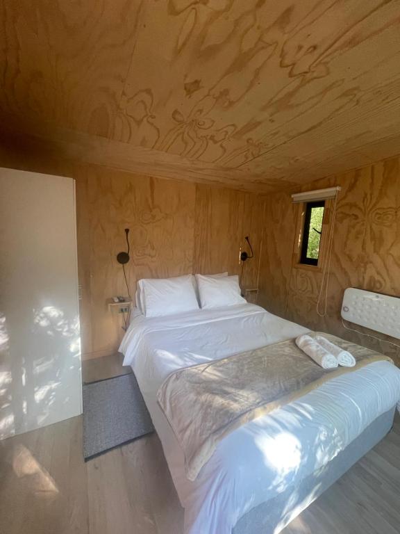 Postel nebo postele na pokoji v ubytování Pucura Eco Lodge
