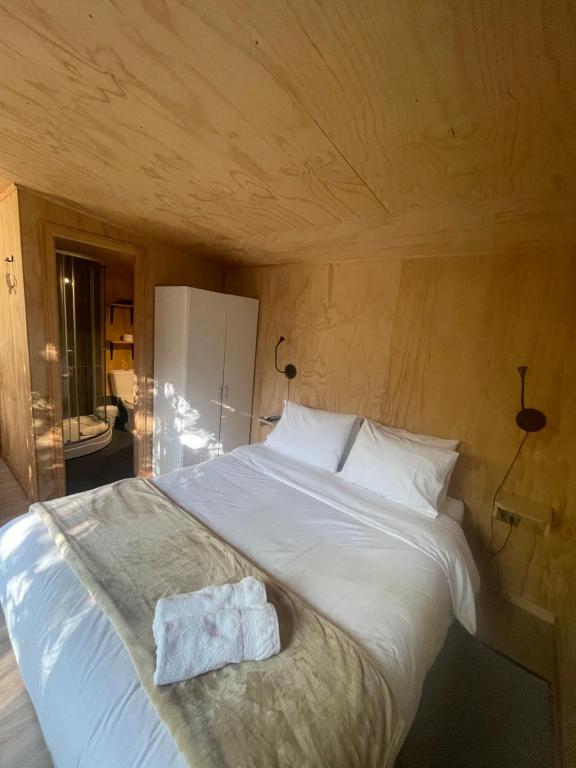 Postel nebo postele na pokoji v ubytování Pucura Eco Lodge