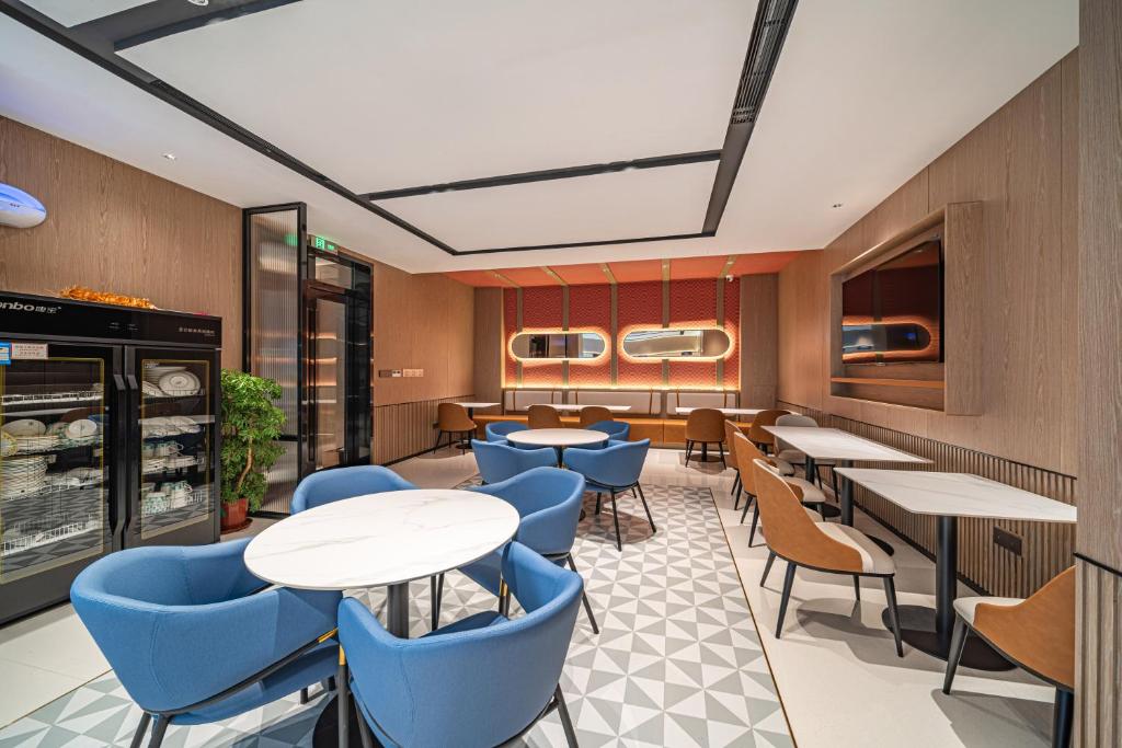 Posezení v ubytování Echarm Hotel Guangzhou Baiyun Station Julong Metro Station