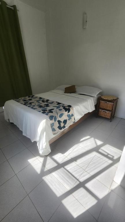 Postel nebo postele na pokoji v ubytování Kap Soley - Ile Rodrigues