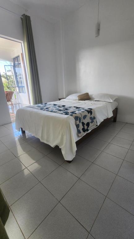 Postel nebo postele na pokoji v ubytování Kap Soley - Ile Rodrigues