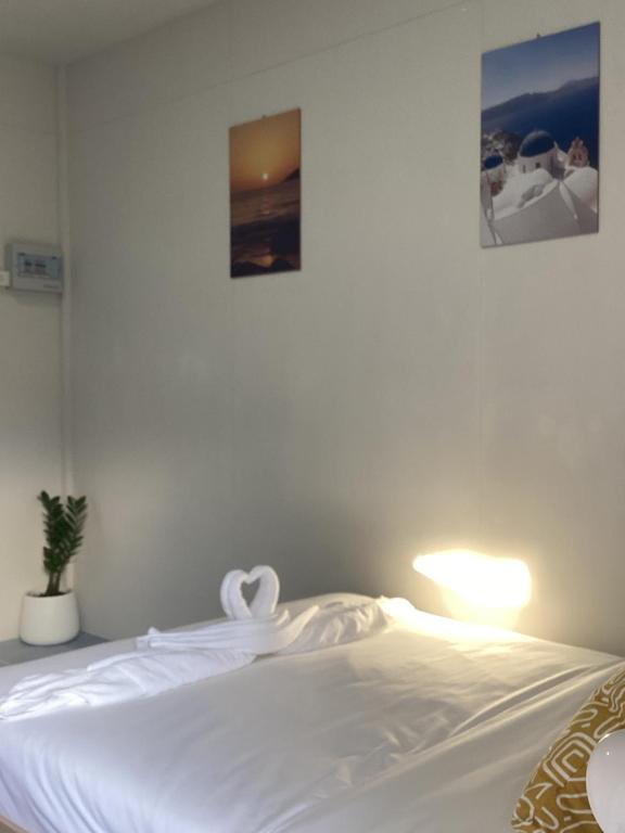 Postel nebo postele na pokoji v ubytování Sunshine guesthouse