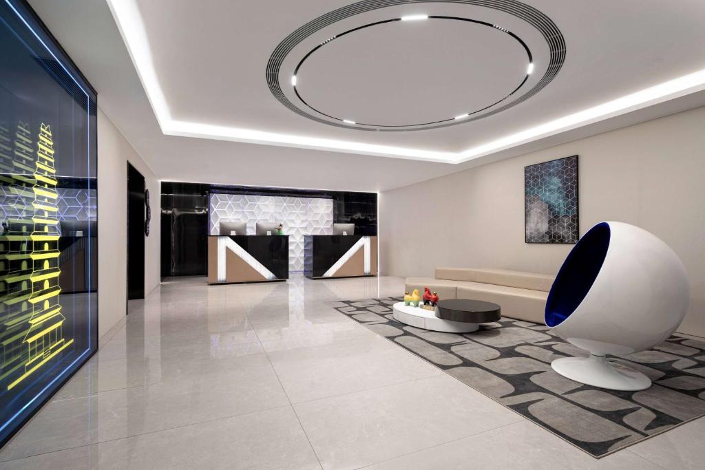 TV a/nebo společenská místnost v ubytování Microtel by Wyndham Xian Beilin