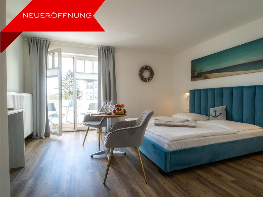 Postel nebo postele na pokoji v ubytování Hotel meerblau