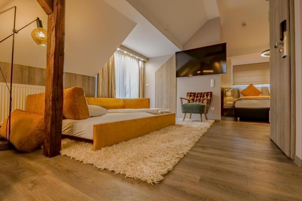 Postel nebo postele na pokoji v ubytování Liebig-Hotel