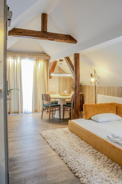 Postel nebo postele na pokoji v ubytování Liebig-Hotel