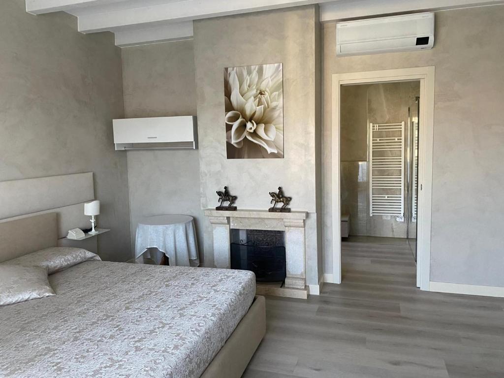 Postel nebo postele na pokoji v ubytování B&B Civico 69 Esclusivo in Franciacorta