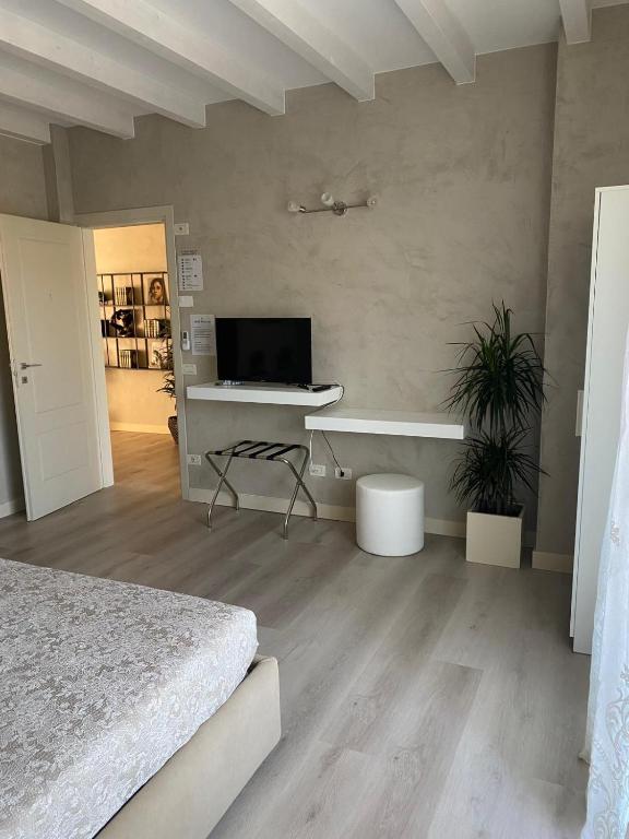 TV a/nebo společenská místnost v ubytování B&B Civico 69 Esclusivo in Franciacorta
