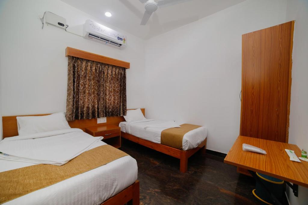 Postel nebo postele na pokoji v ubytování Mymoon service apartment