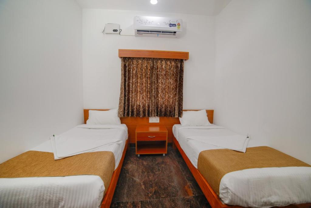 Postel nebo postele na pokoji v ubytování Mymoon service apartment