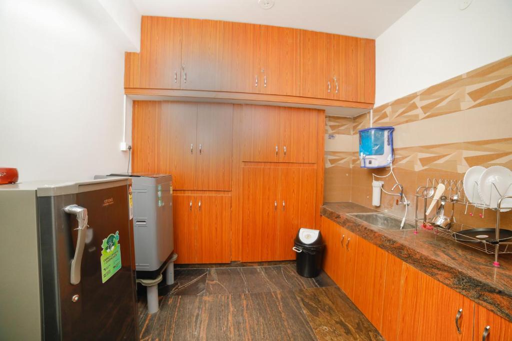 Kuchyň nebo kuchyňský kout v ubytování Mymoon service apartment