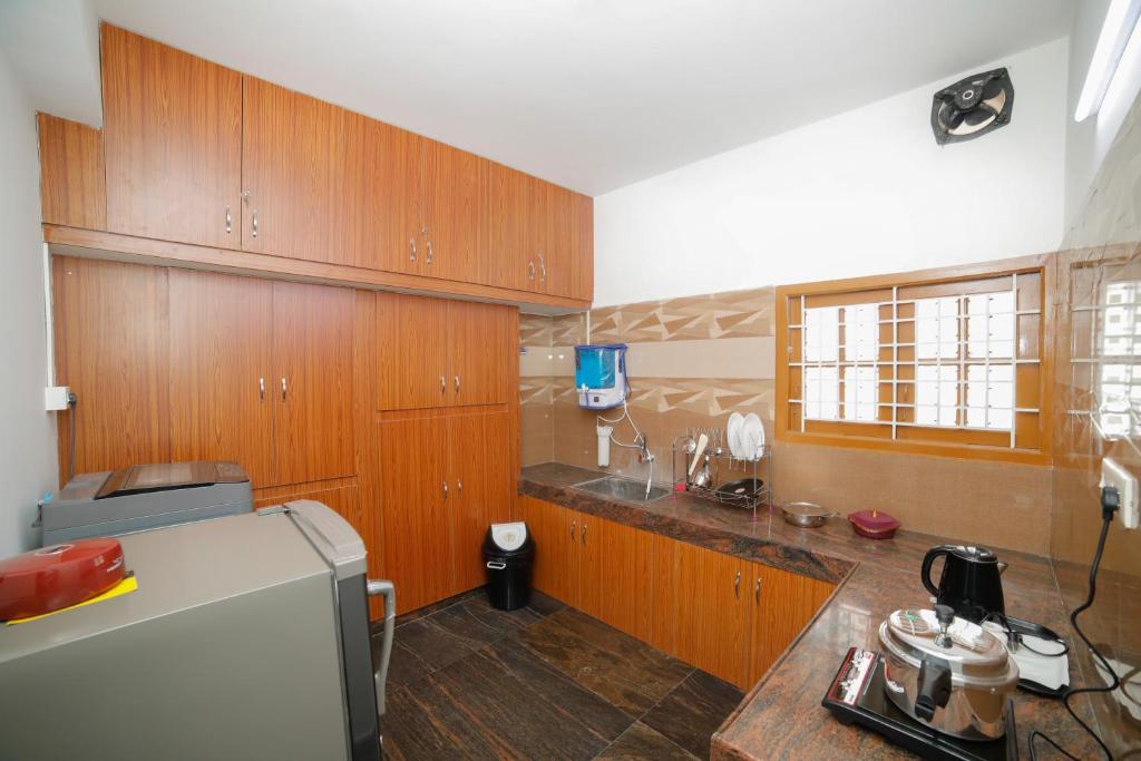 Kuchyň nebo kuchyňský kout v ubytování Mymoon service apartment