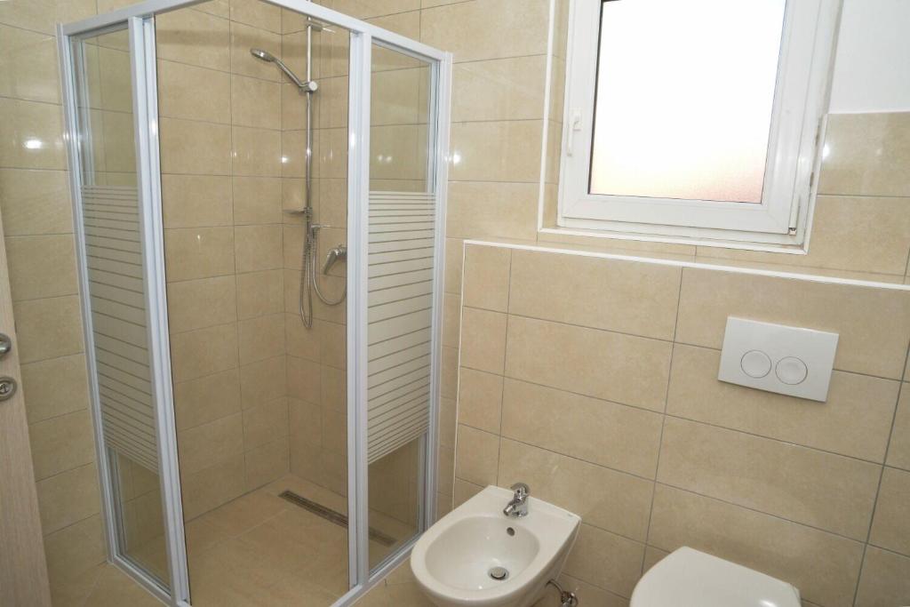 Kúpeľňa v ubytovaní Apartment Miki