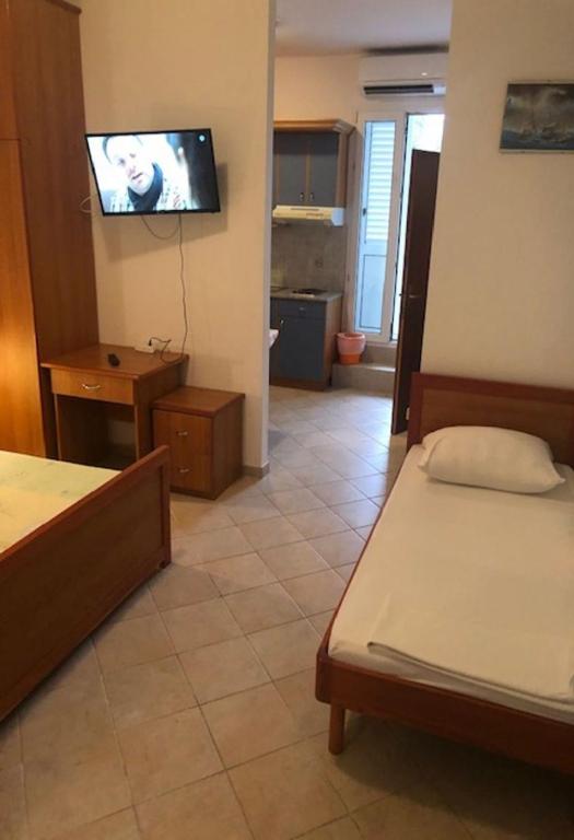 Łóżko lub łóżka w pokoju w obiekcie Apartments Denko