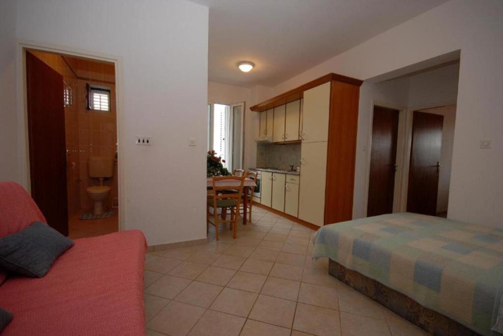 Łóżko lub łóżka w pokoju w obiekcie Apartments Denko