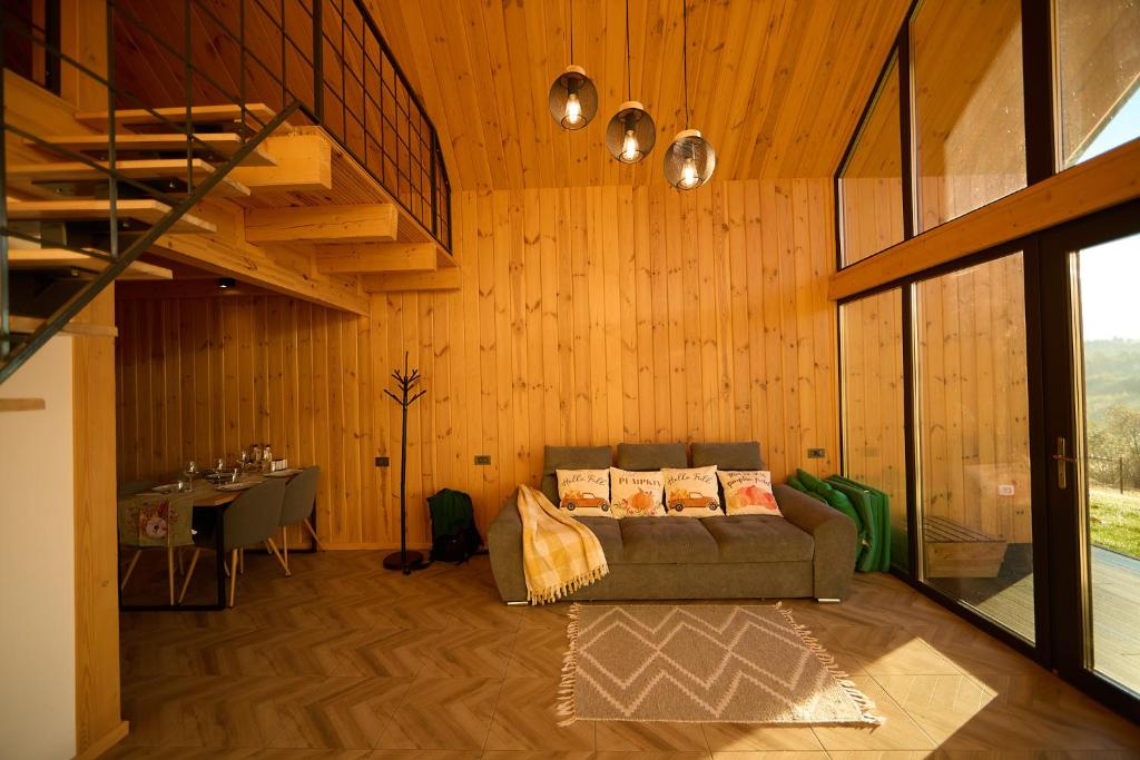 Posezení v ubytování Scandinave Chalet Bran