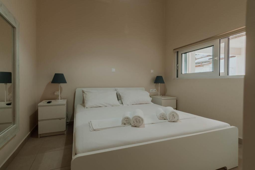 Postel nebo postele na pokoji v ubytování Sea Wave Resort 1