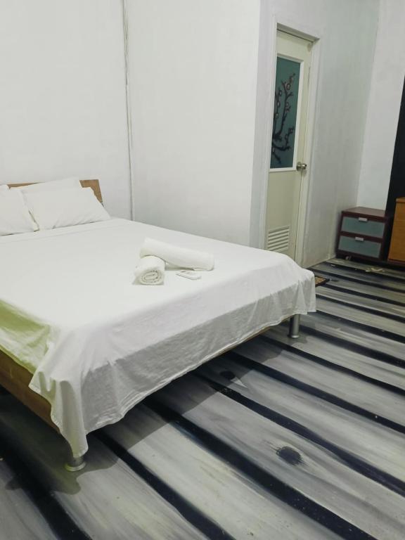 Postel nebo postele na pokoji v ubytování Mylene Room Rental