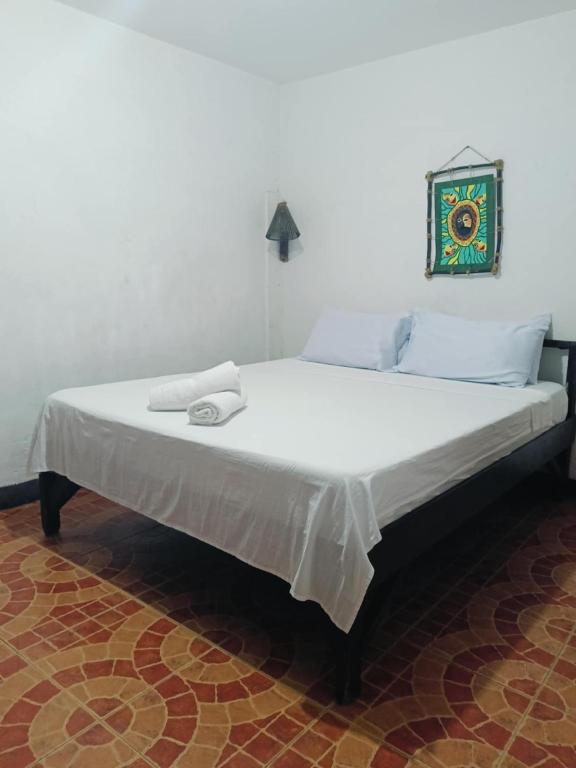 Postel nebo postele na pokoji v ubytování Mylene Room Rental