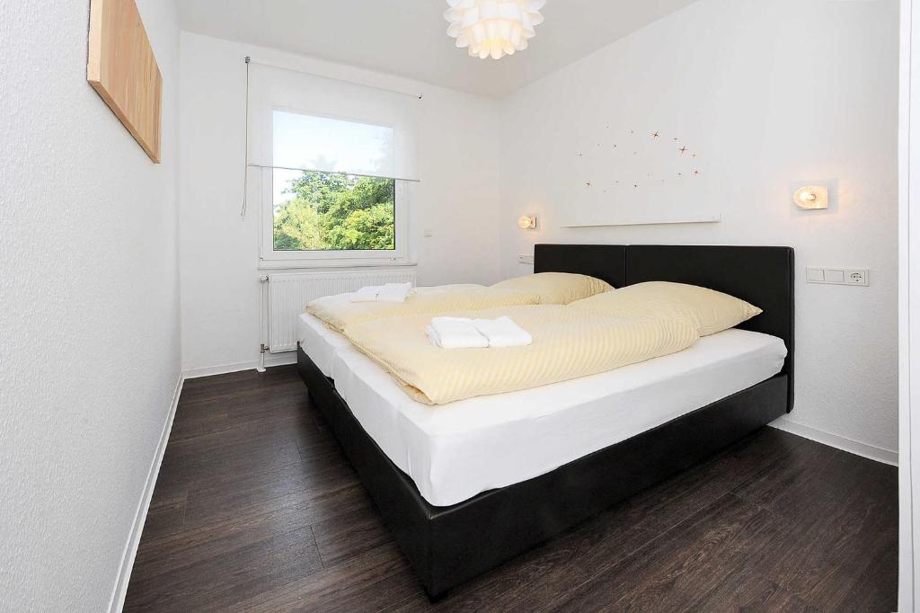 Postel nebo postele na pokoji v ubytování Haus Kunterbunt