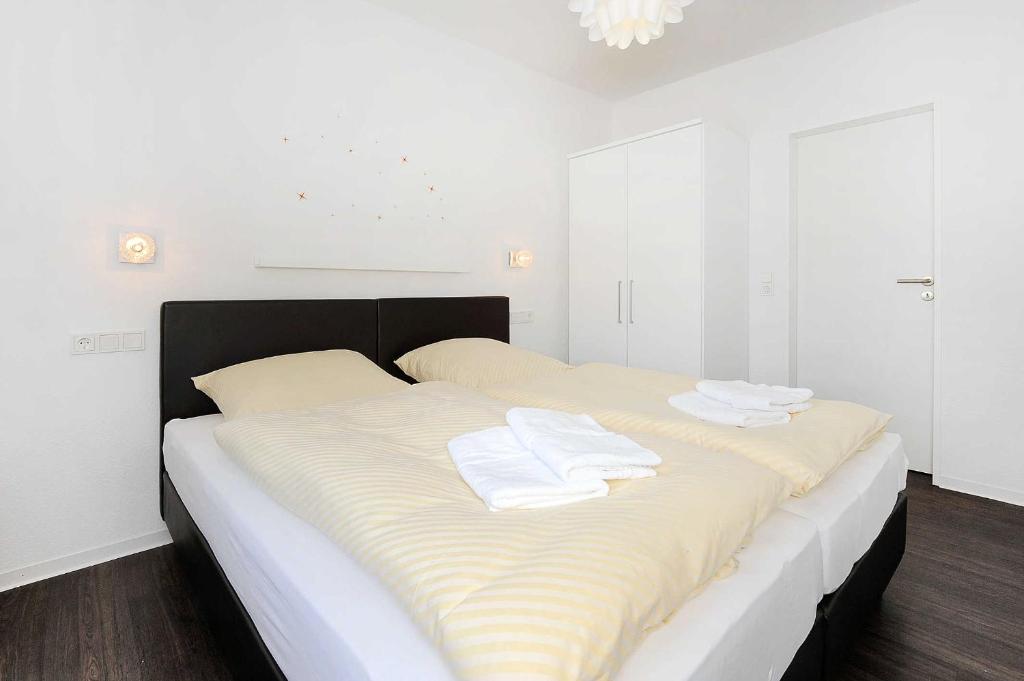 Postel nebo postele na pokoji v ubytování Haus Kunterbunt