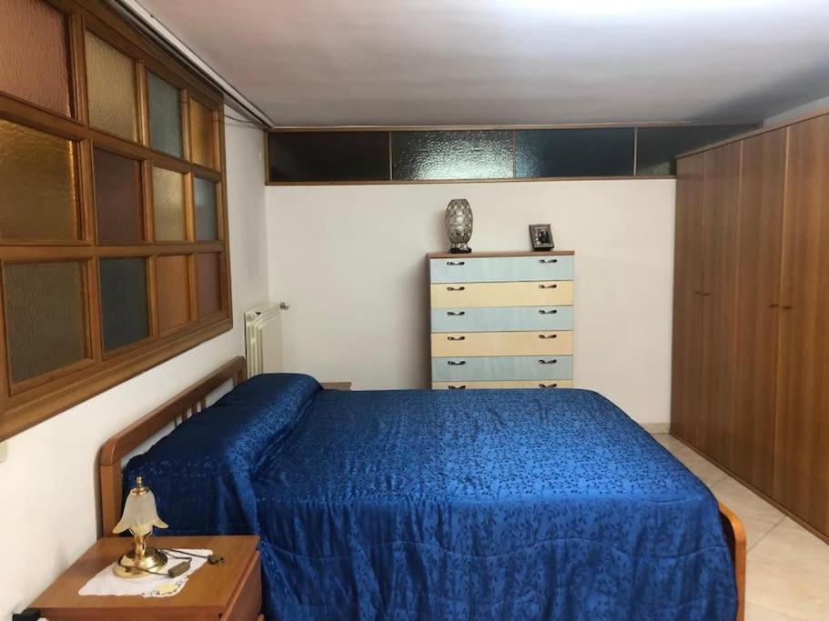 Postel nebo postele na pokoji v ubytování Deliziosa tavernetta