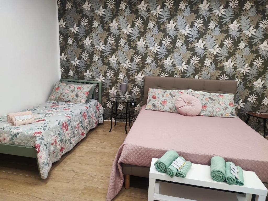 Postel nebo postele na pokoji v ubytování DN Holiday House