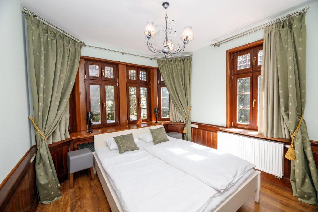 Posteľ alebo postele v izbe v ubytovaní Apartamenty Silva Szklarska Poręba