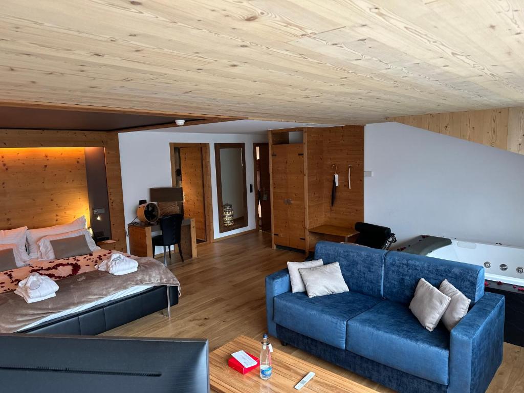 Posezení v ubytování Hôtel Cailler & Bains de la Gruyère