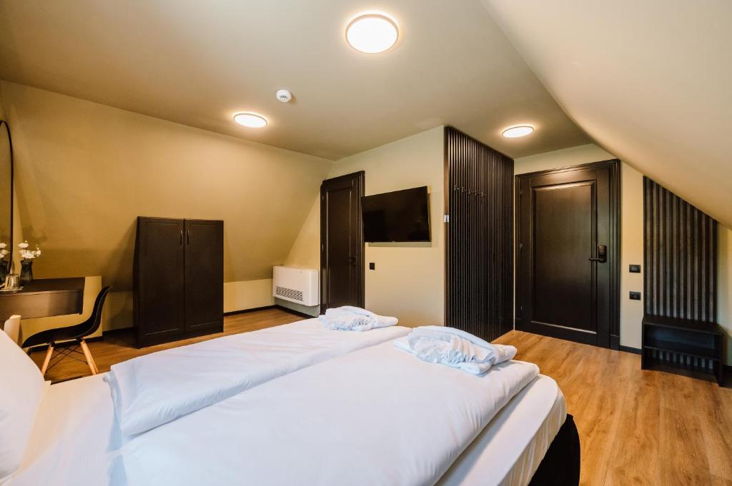 Postel nebo postele na pokoji v ubytování Motel Oasis