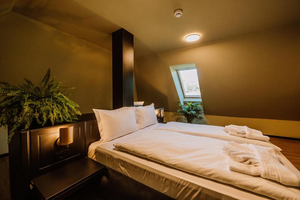 Postel nebo postele na pokoji v ubytování Motel Oasis