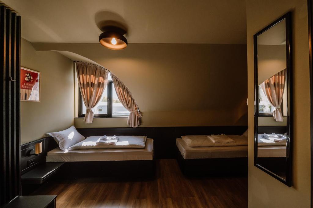 Postel nebo postele na pokoji v ubytování Motel Oasis