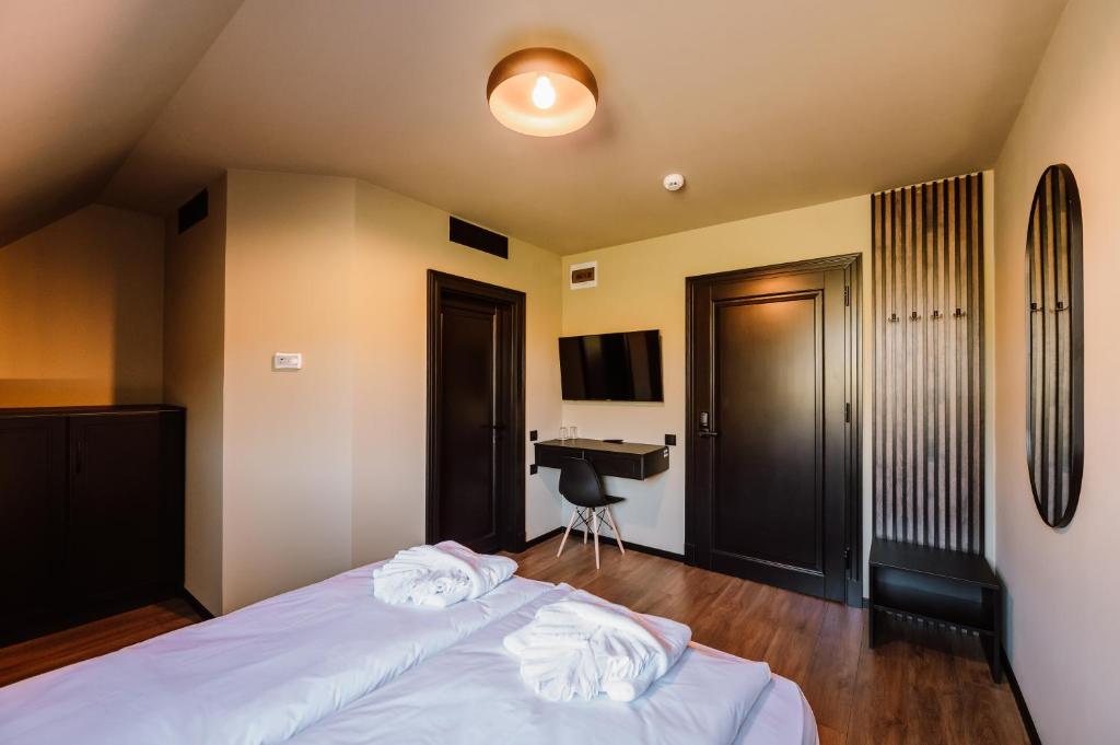 Postel nebo postele na pokoji v ubytování Motel Oasis
