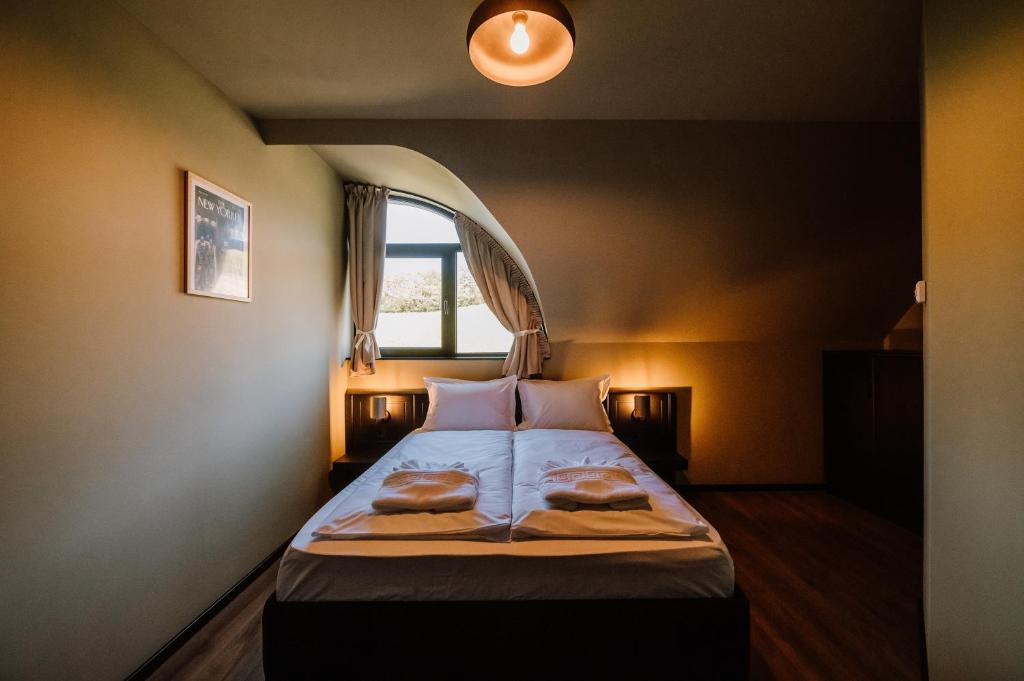 Postel nebo postele na pokoji v ubytování Motel Oasis