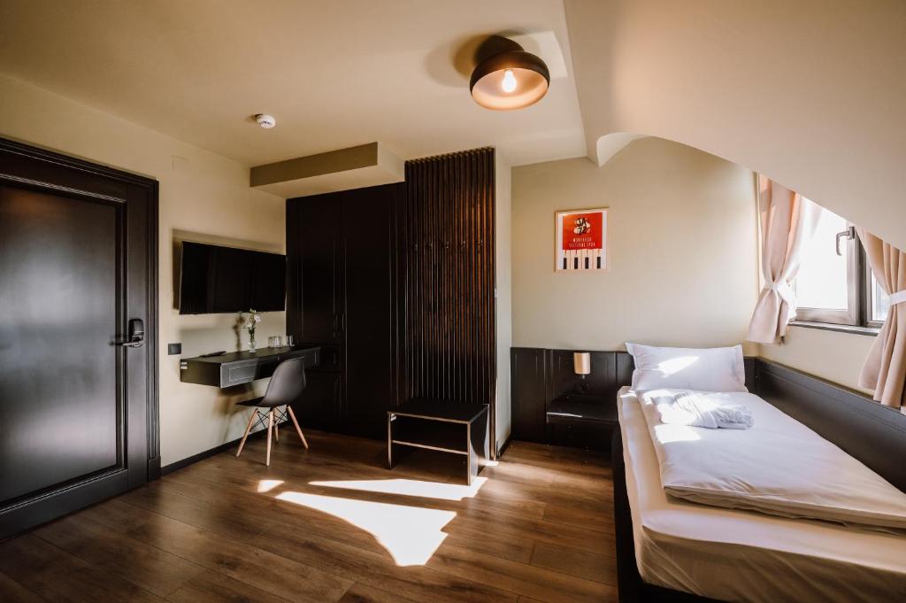 Postel nebo postele na pokoji v ubytování Motel Oasis