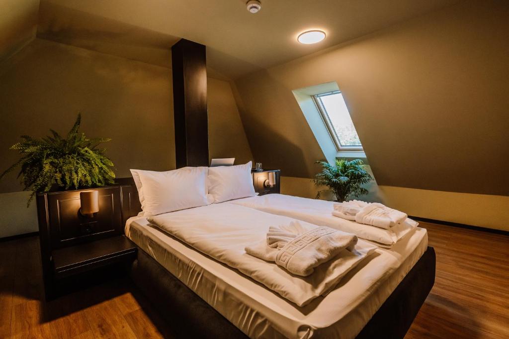Postel nebo postele na pokoji v ubytování Motel Oasis
