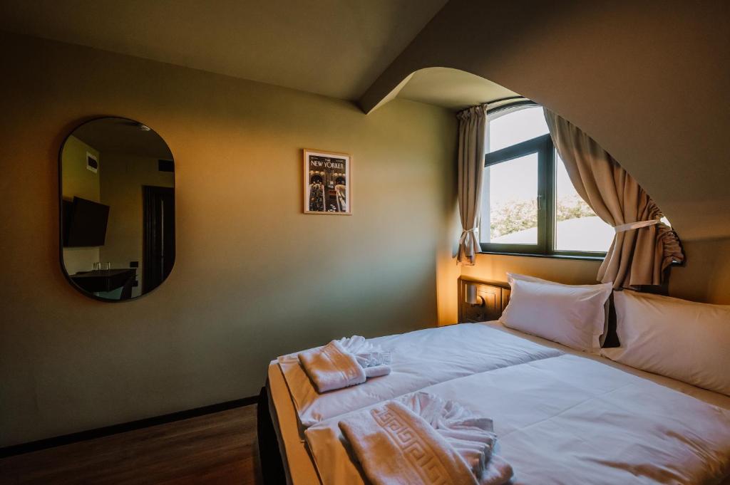 Postel nebo postele na pokoji v ubytování Motel Oasis