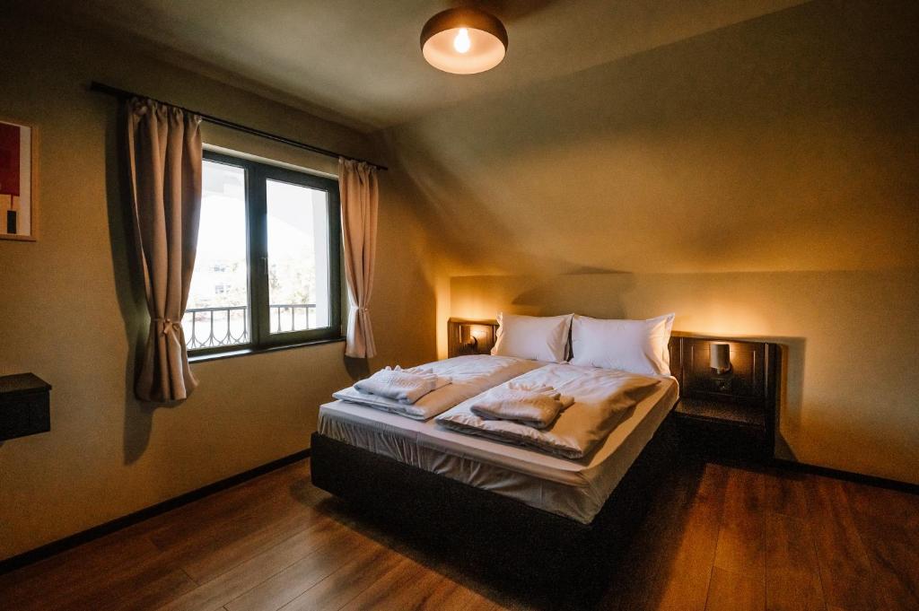 Postel nebo postele na pokoji v ubytování Motel Oasis