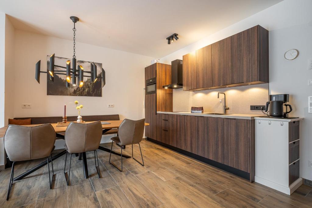 Kuchyň nebo kuchyňský kout v ubytování Alpenzauber Apartments by Monteviva