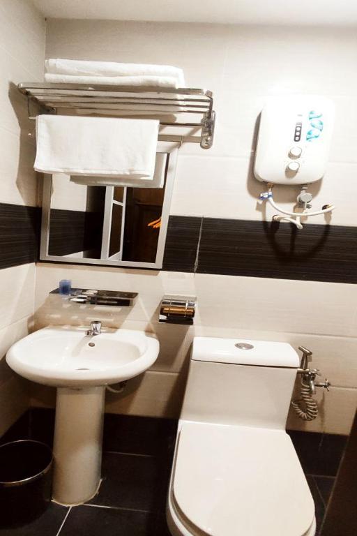 Koupelna v ubytování ABA Hotel Kuching Sarawak