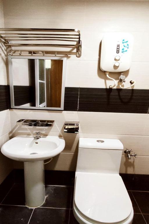 Koupelna v ubytování ABA Hotel Kuching Sarawak