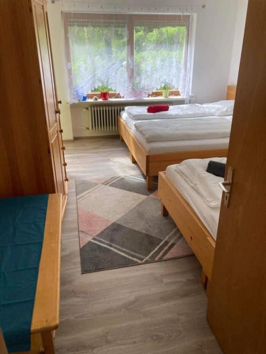 Postel nebo postele na pokoji v ubytování F&F Apartment