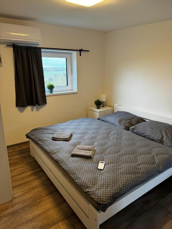 Postel nebo postele na pokoji v ubytování Apartmán 2 Jägerhaus