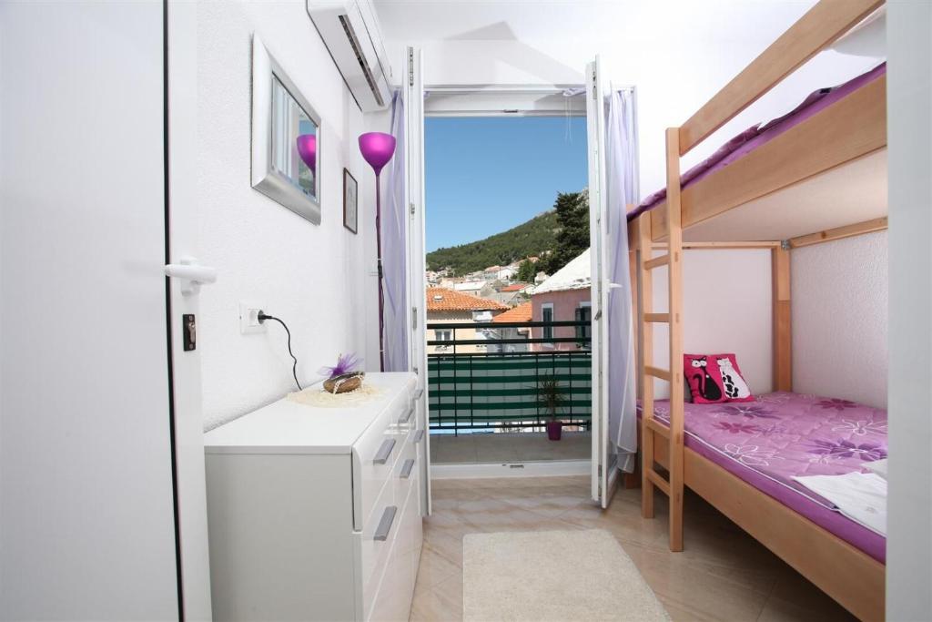 Posteľ alebo postele v izbe v ubytovaní Apartment Rilka