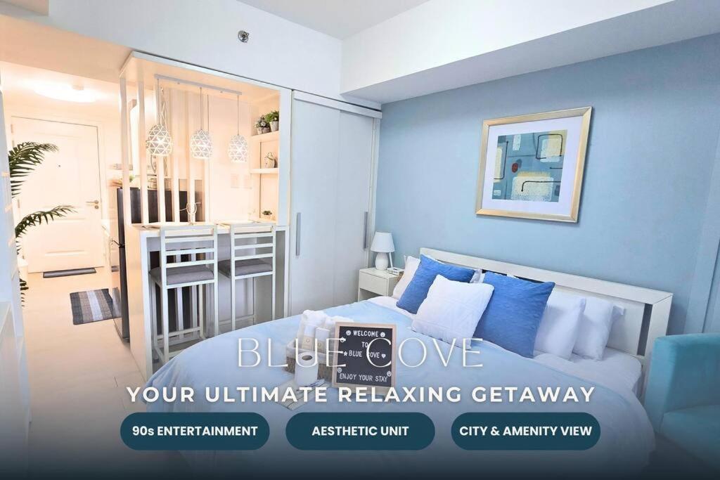 Katil atau katil-katil dalam bilik di Relaxing and Peaceful Pet-friendly Studio with Pool and City View balcony, Netflix, 90s Boardgames & Karaoke